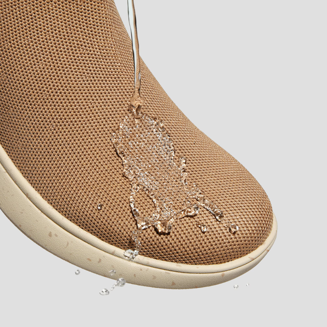 Botas deportivas sin cordones con puntera redondeada